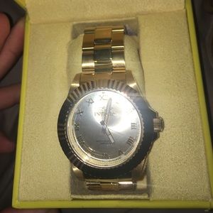 Brand new men’s invicta golds watch.